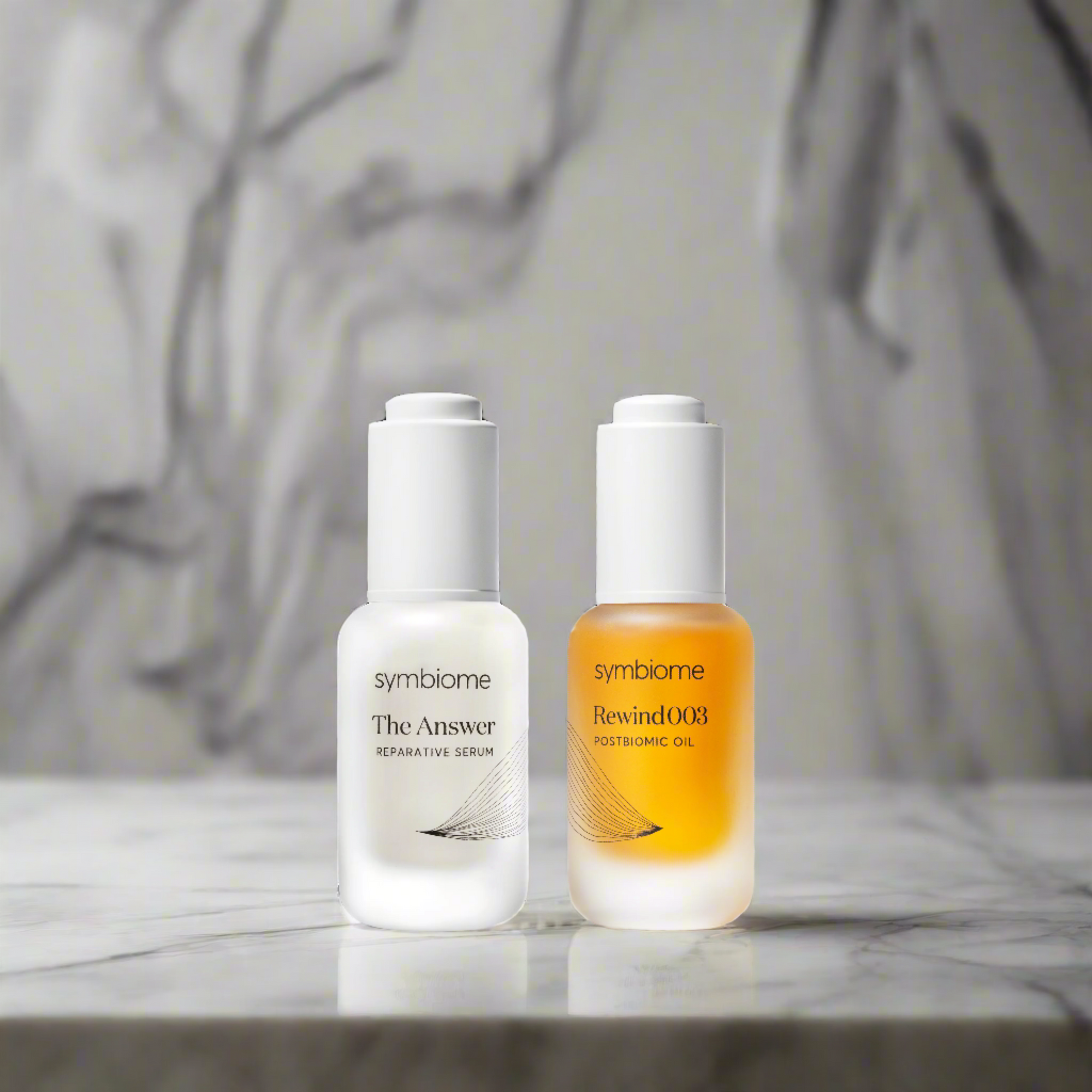 Supple Skin Set - The Answer Reparative Serum + Rewind003 Age-Defying Postbiomic Oil