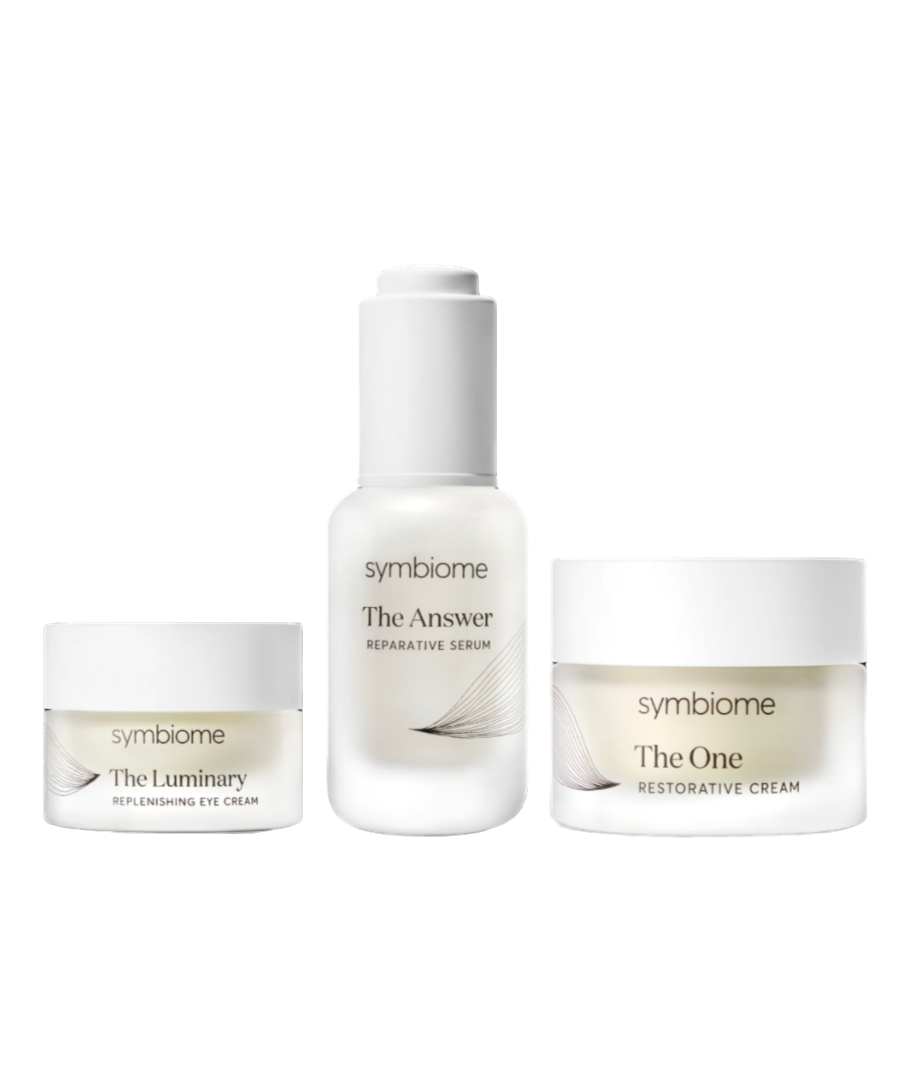 Three skincare products from the brand 'symbiome' on a white background