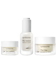 Three skincare products from the brand 'symbiome' on a white background